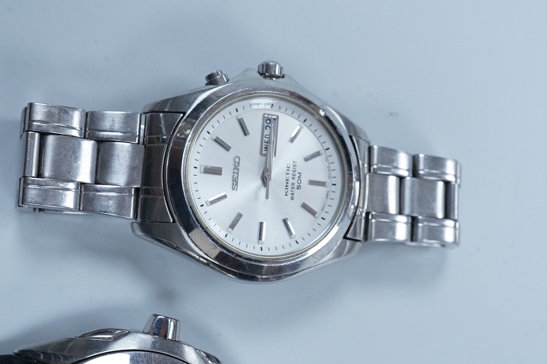 A gentleman's 1970's stainless steel Omega Dynamic manual wind wrist watch, with blue dial and baton numerals, case diameter 40mm, on a leather strap wit Omega buckle, together with a gentleman's Seiko Kinetic and a simi